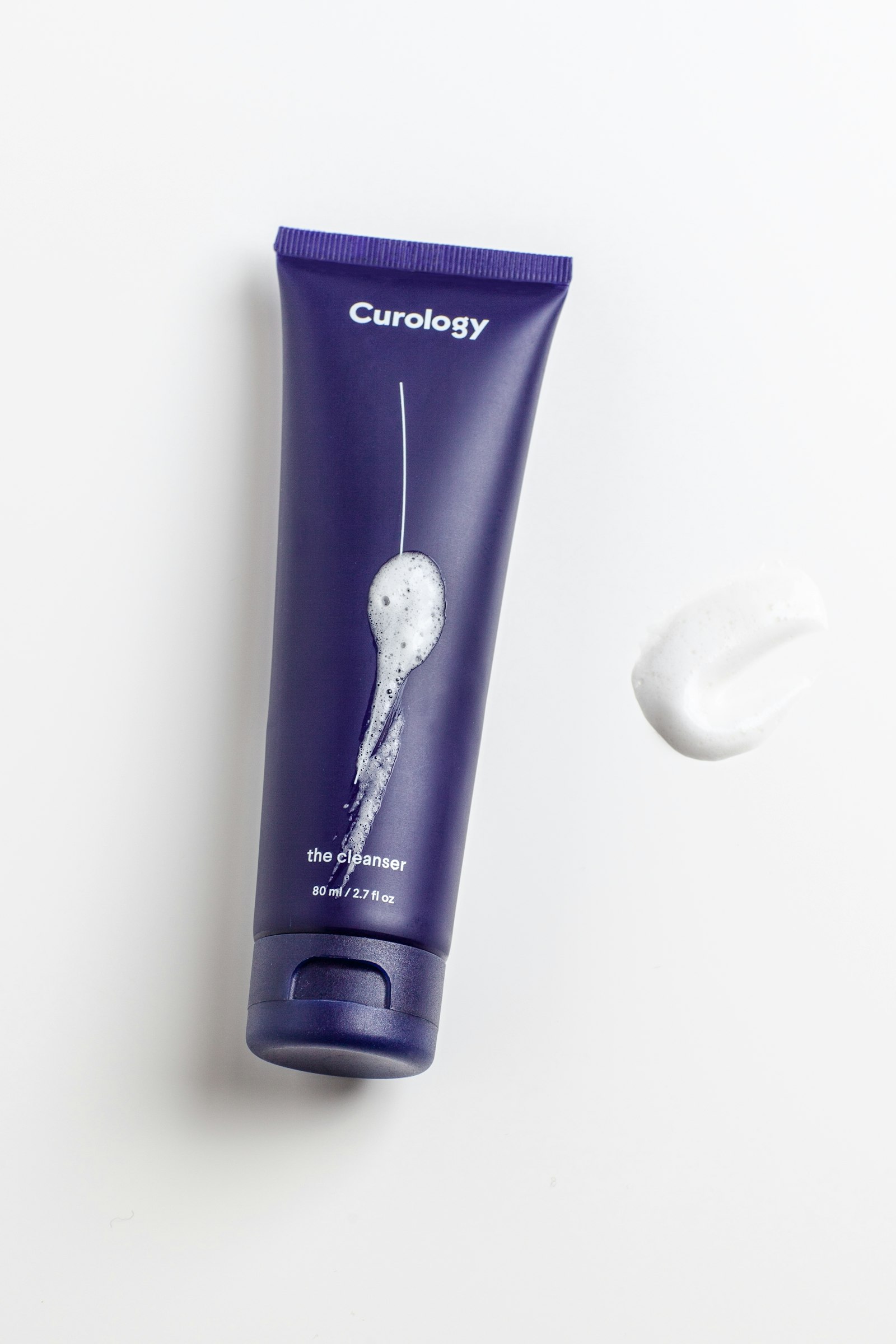 DTC skincare product photography in a bright studio setting
